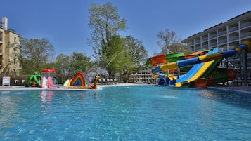 Indoor pool, seasonal outdoor pool, pool umbrellas, pool loungers