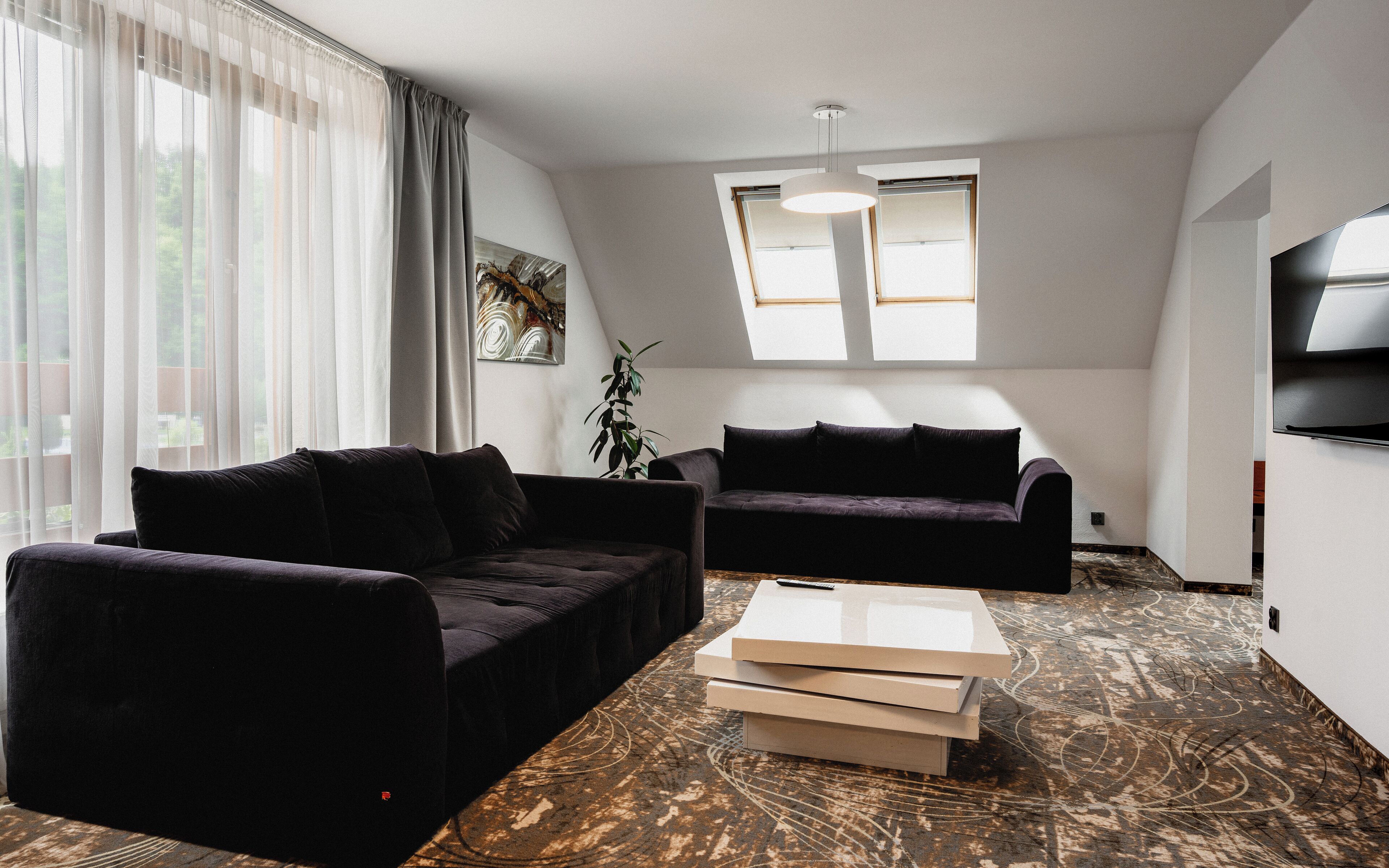 exclusive suite, 3 bedrooms | living room | tv