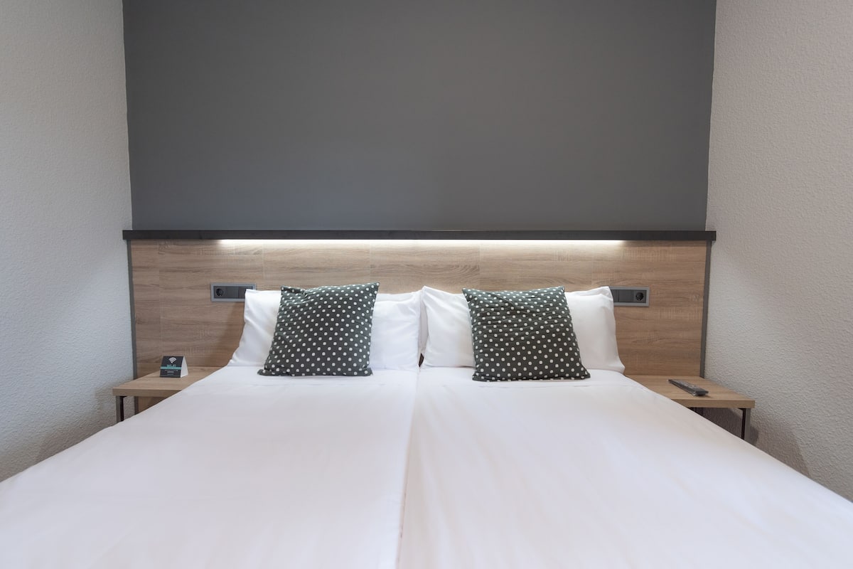 Desk, free WiFi, bed sheets