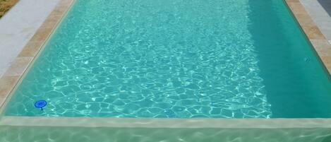 Outdoor pool, sun loungers