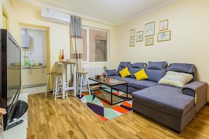 Suite, 2 habitaciones | Zona de estar