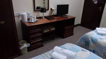 Twin Room | 1 bedroom, desk, iron/ironing board, rollaway beds