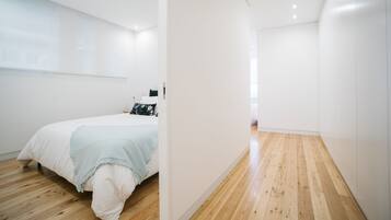 Deluxe Apartment, Multiple Beds | 1 bedroom, in-room safe, individually decorated, iron/ironing board