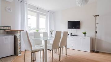 Standard Apartment, 1 Bedroom (Posejdon) | Living area | Flat-screen TV