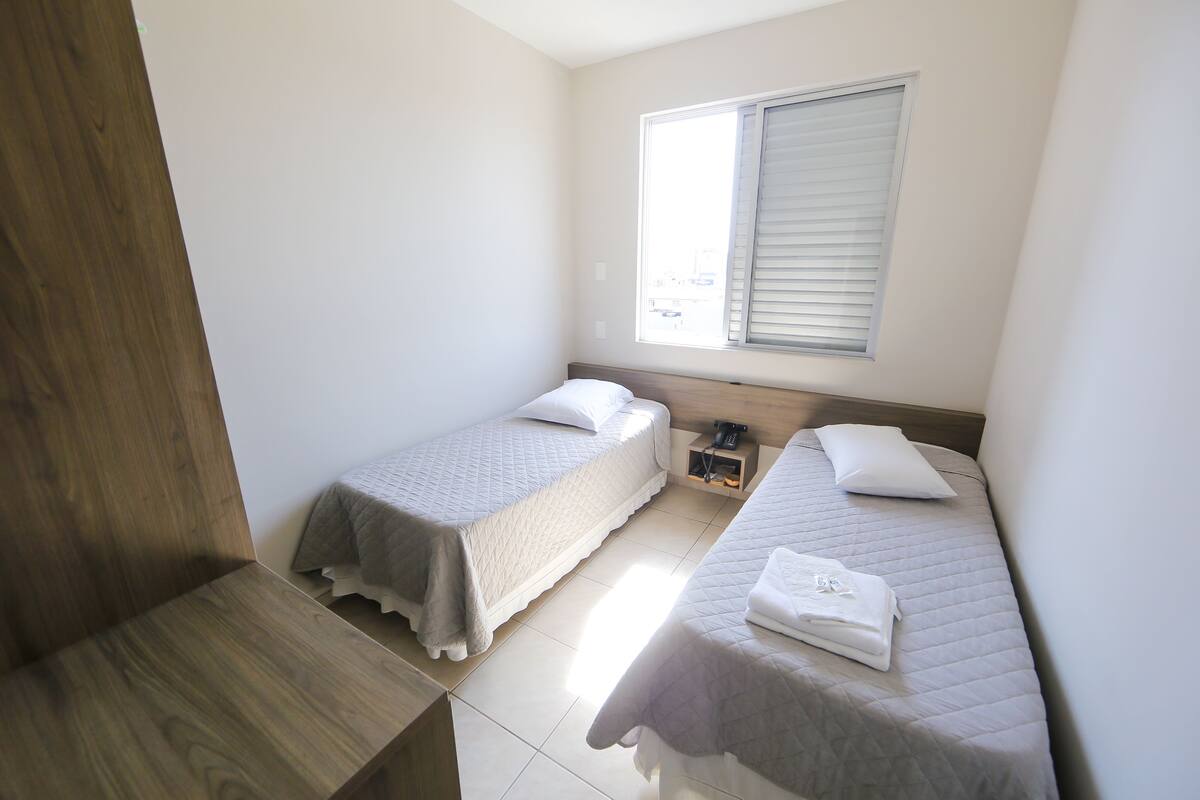 Basic Twin Room, 2 Single Beds | Minibar, desk, iron/ironing board, free WiFi