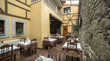 Breakfast, lunch, dinner served; local cuisine