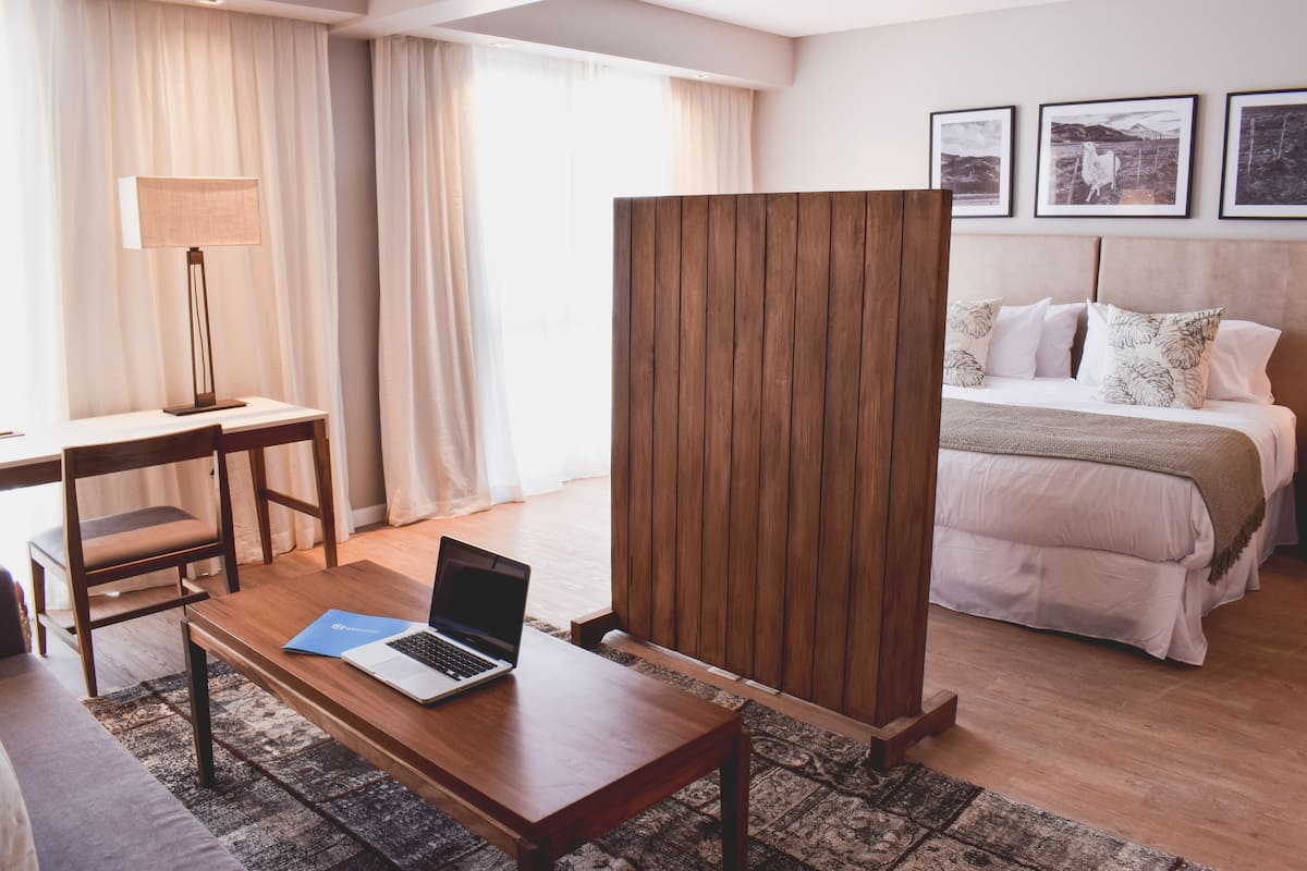 Executive Suite | 1 bedroom, premium bedding, down comforters, minibar