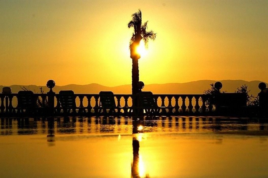 Indoor pool, outdoor pool, pool umbrellas, sun loungers