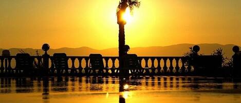 Indoor pool, outdoor pool, pool umbrellas, sun loungers