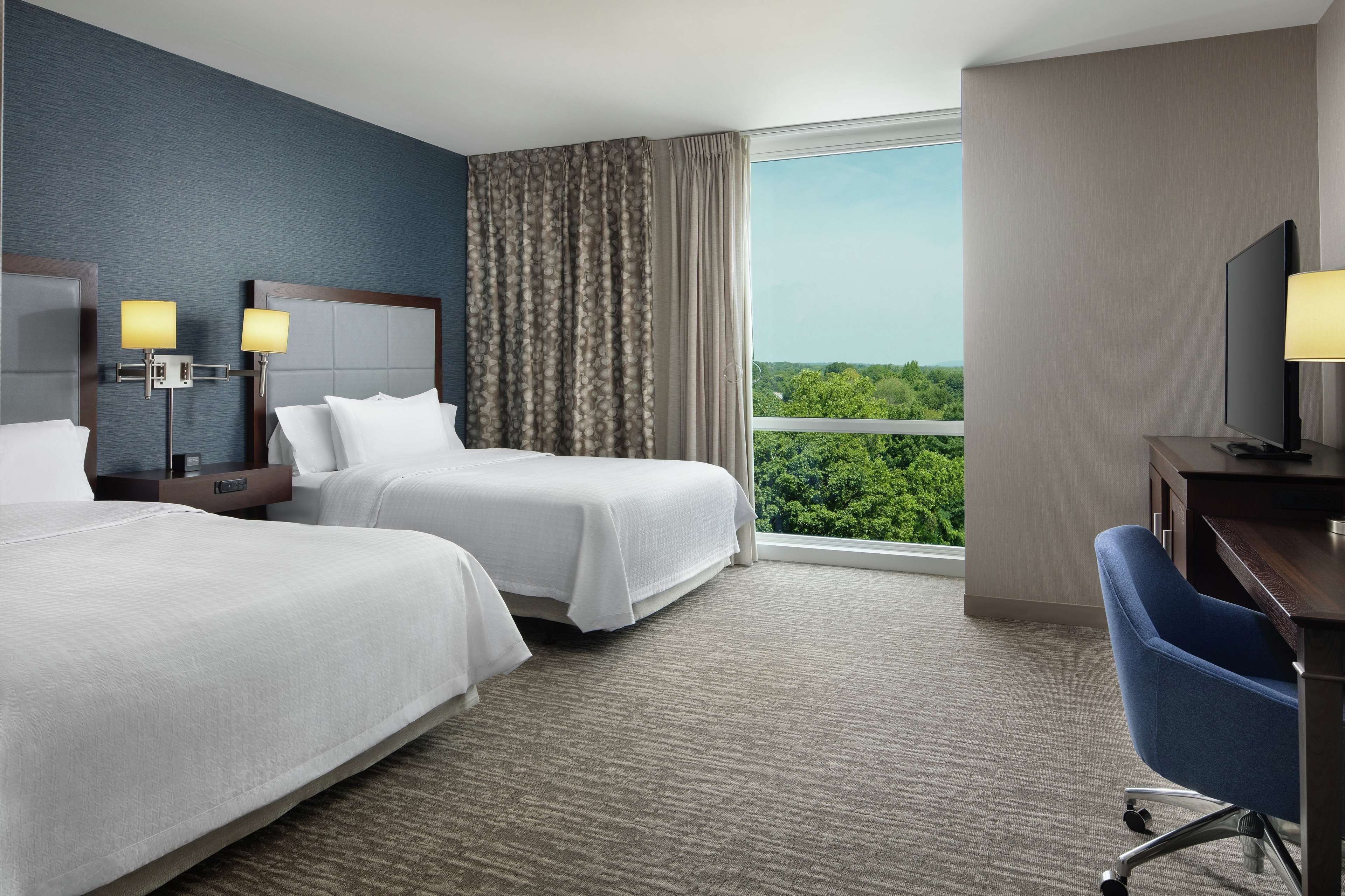 desk, laptop workspace, blackout curtains, iron/ironing board