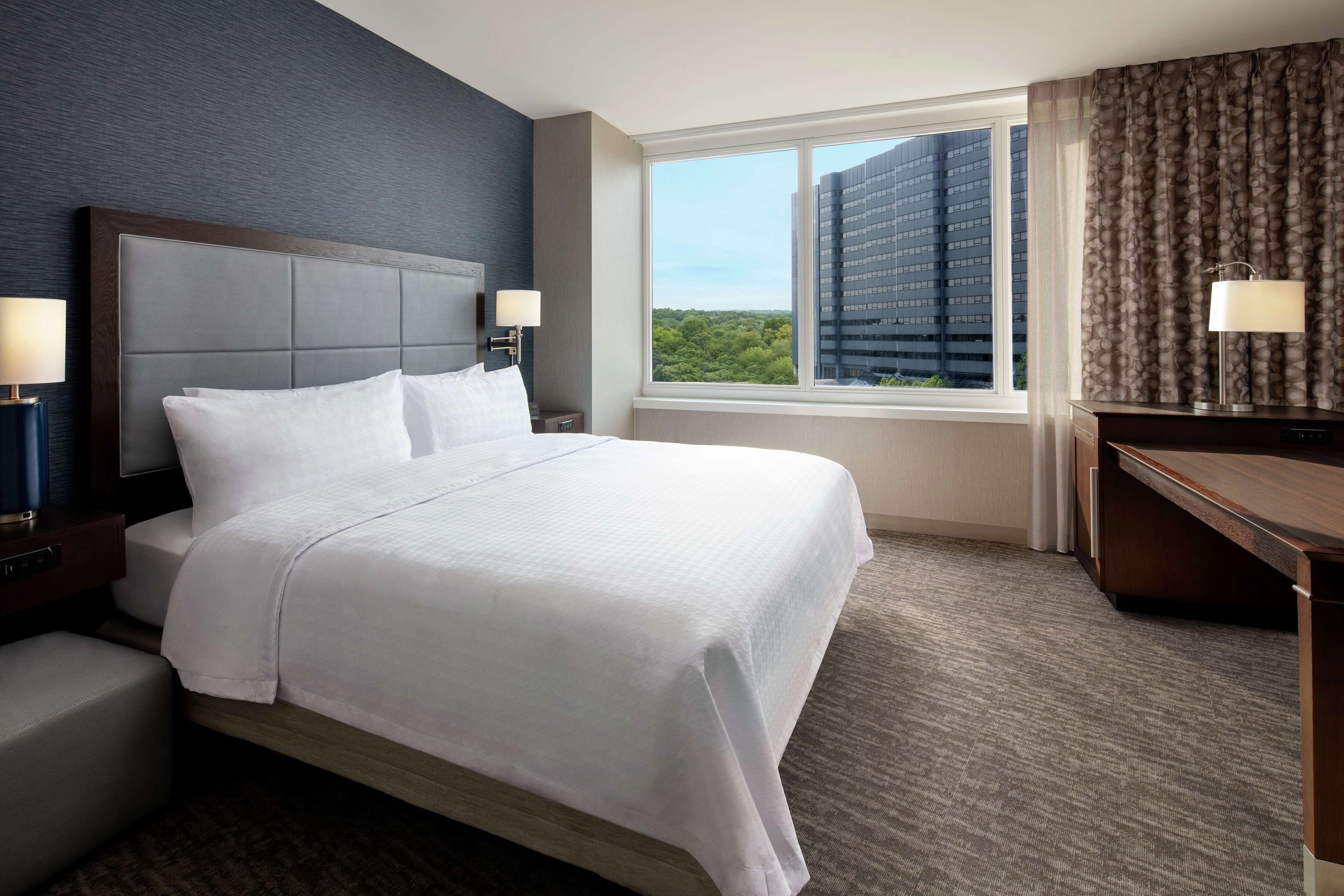 desk, laptop workspace, blackout curtains, iron/ironing board