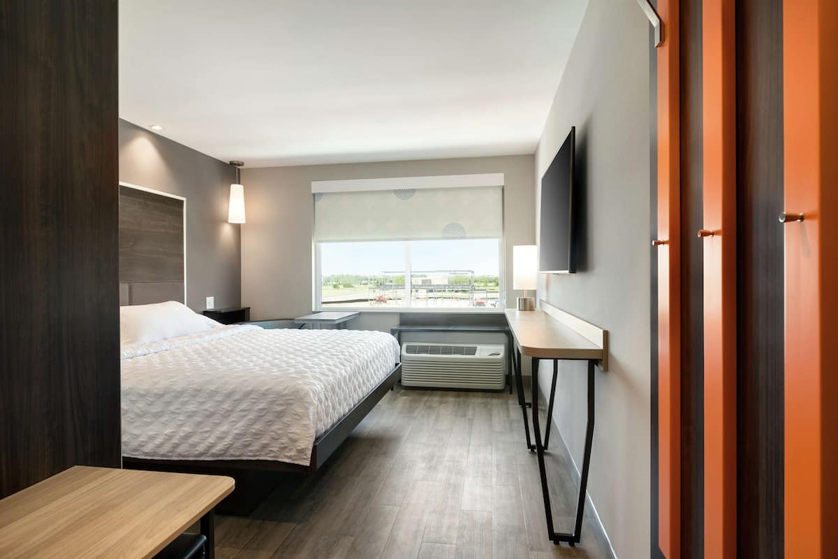 Desk, laptop workspace, blackout curtains, free WiFi