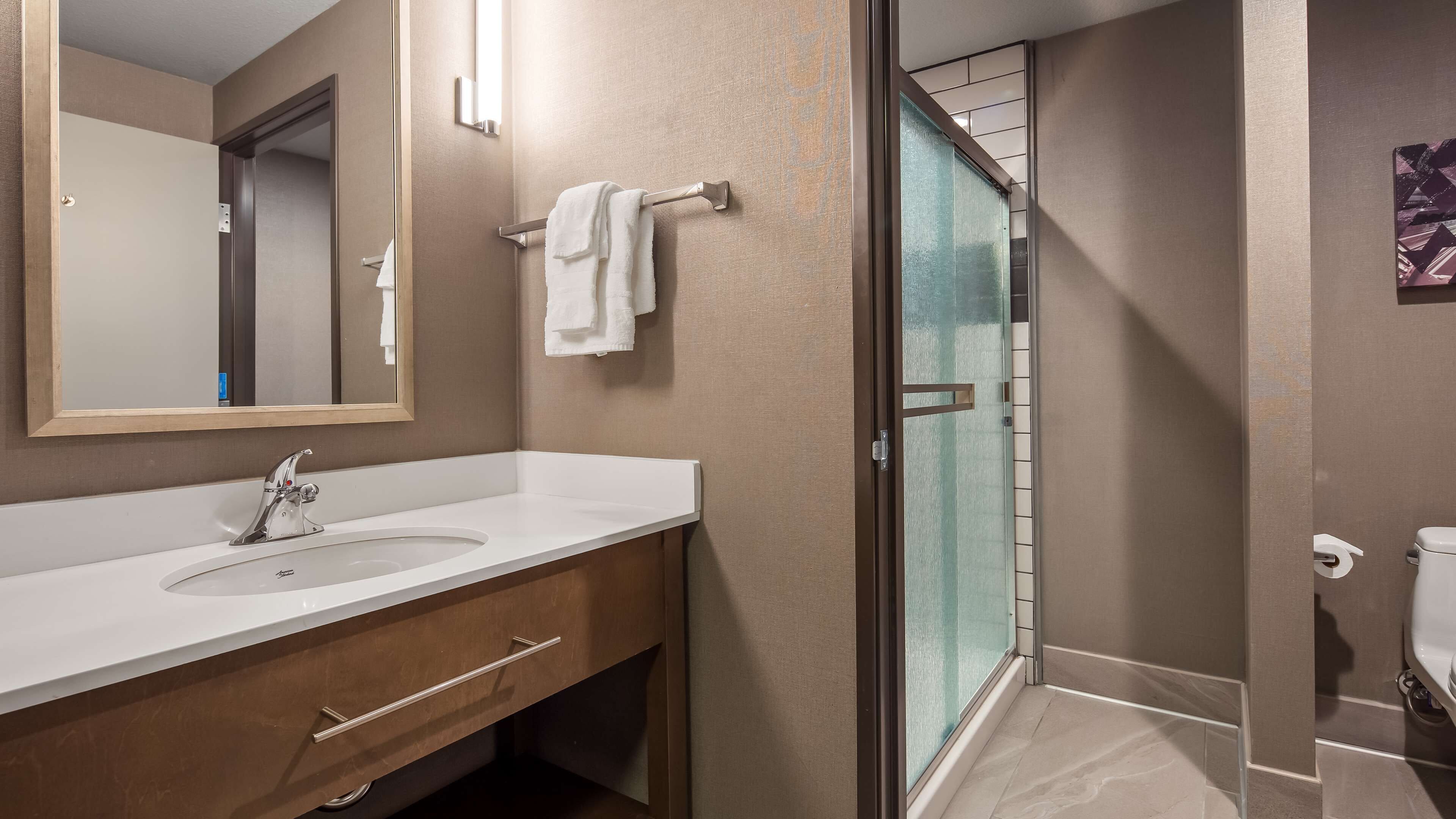 pillow-top beds, desk, blackout curtains, soundproofing