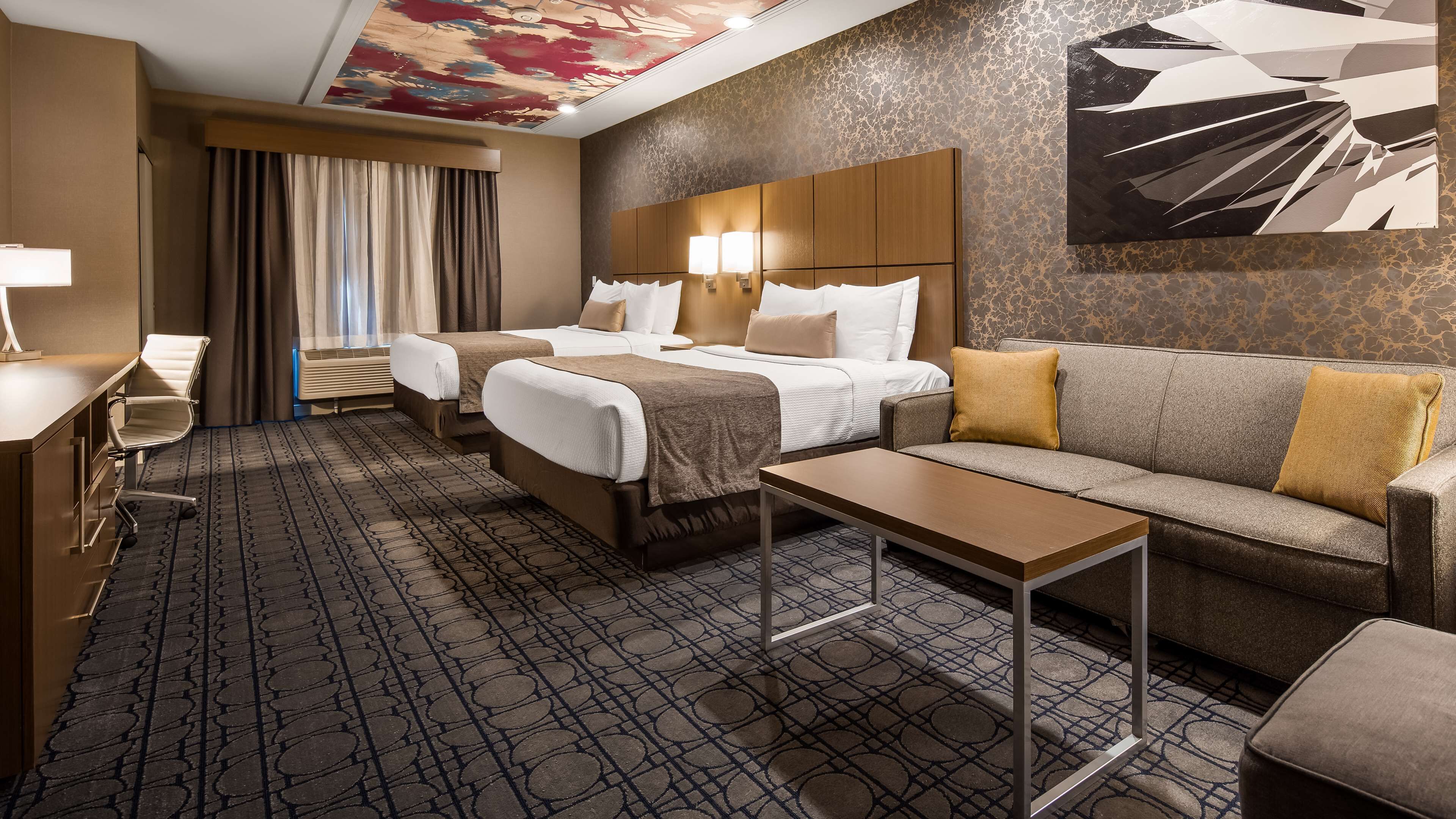 pillow-top beds, desk, blackout curtains, soundproofing