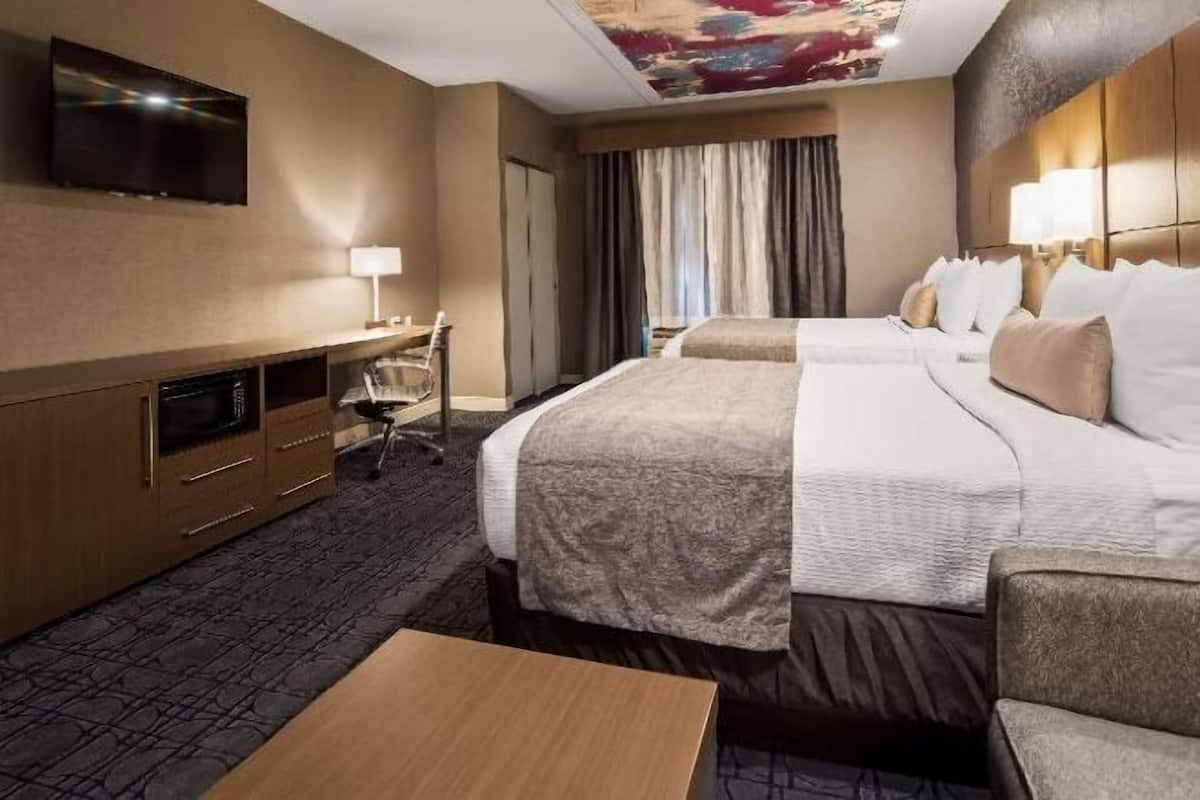 Pillow-top beds, desk, blackout curtains, soundproofing