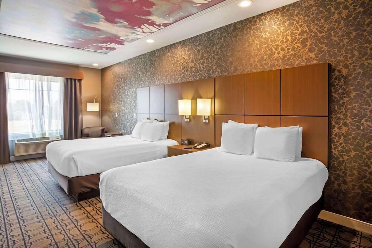 Pillow-top beds, desk, blackout curtains, soundproofing
