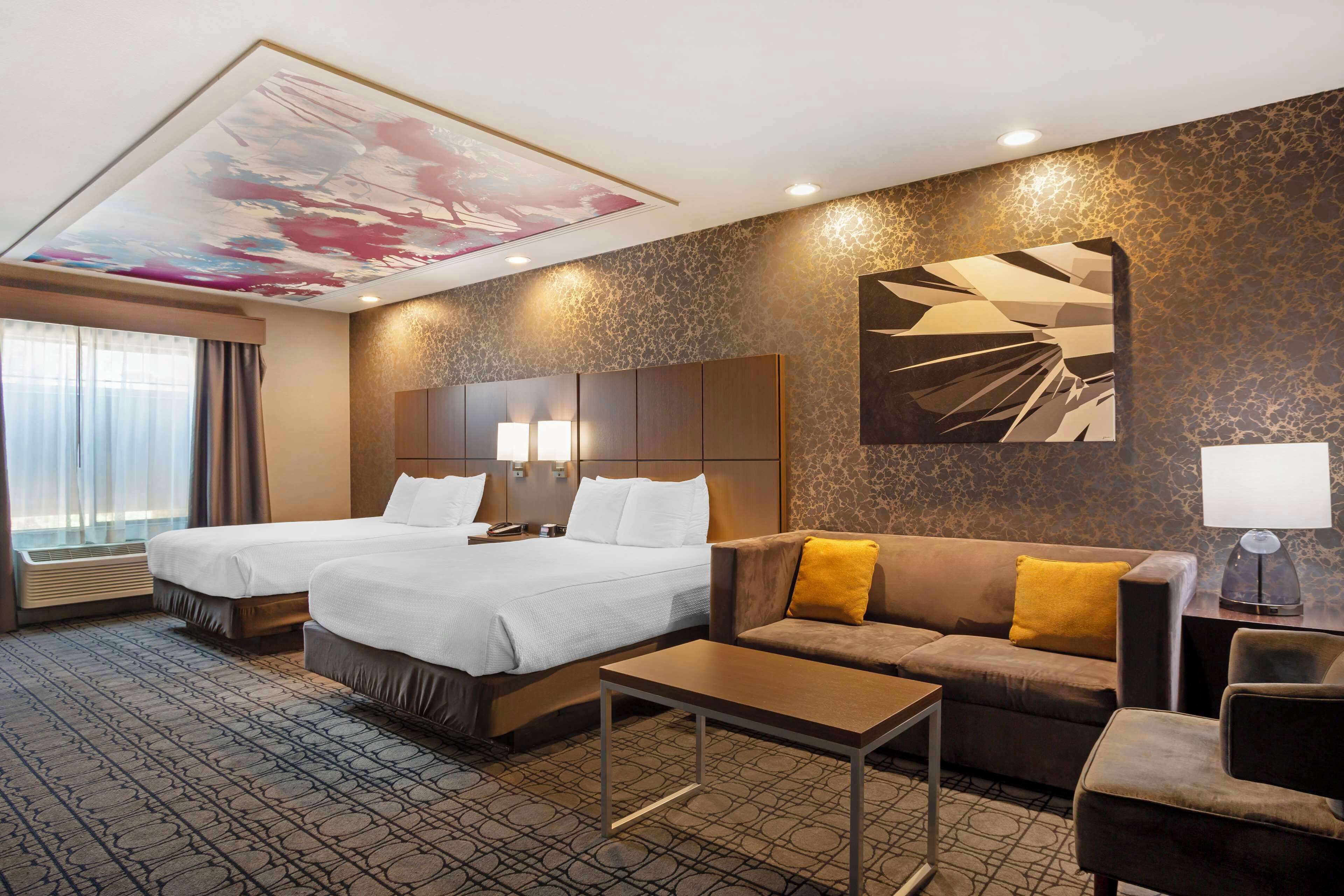 Pillow-top beds, desk, blackout curtains, soundproofing