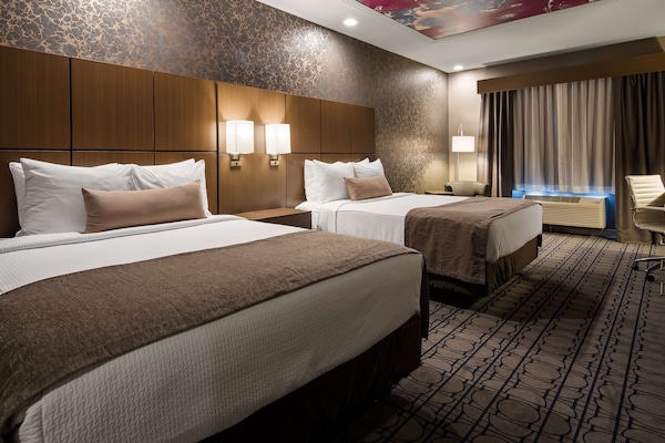 Pillow-top beds, desk, blackout curtains, soundproofing