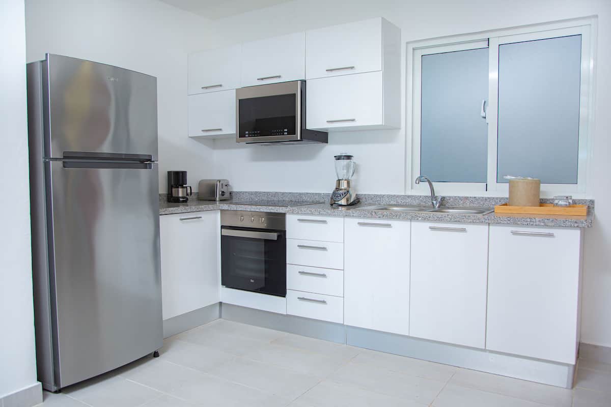 apartment, 2 bedrooms, pool view | private kitchenette | mini-fridge, coffee/tea maker
