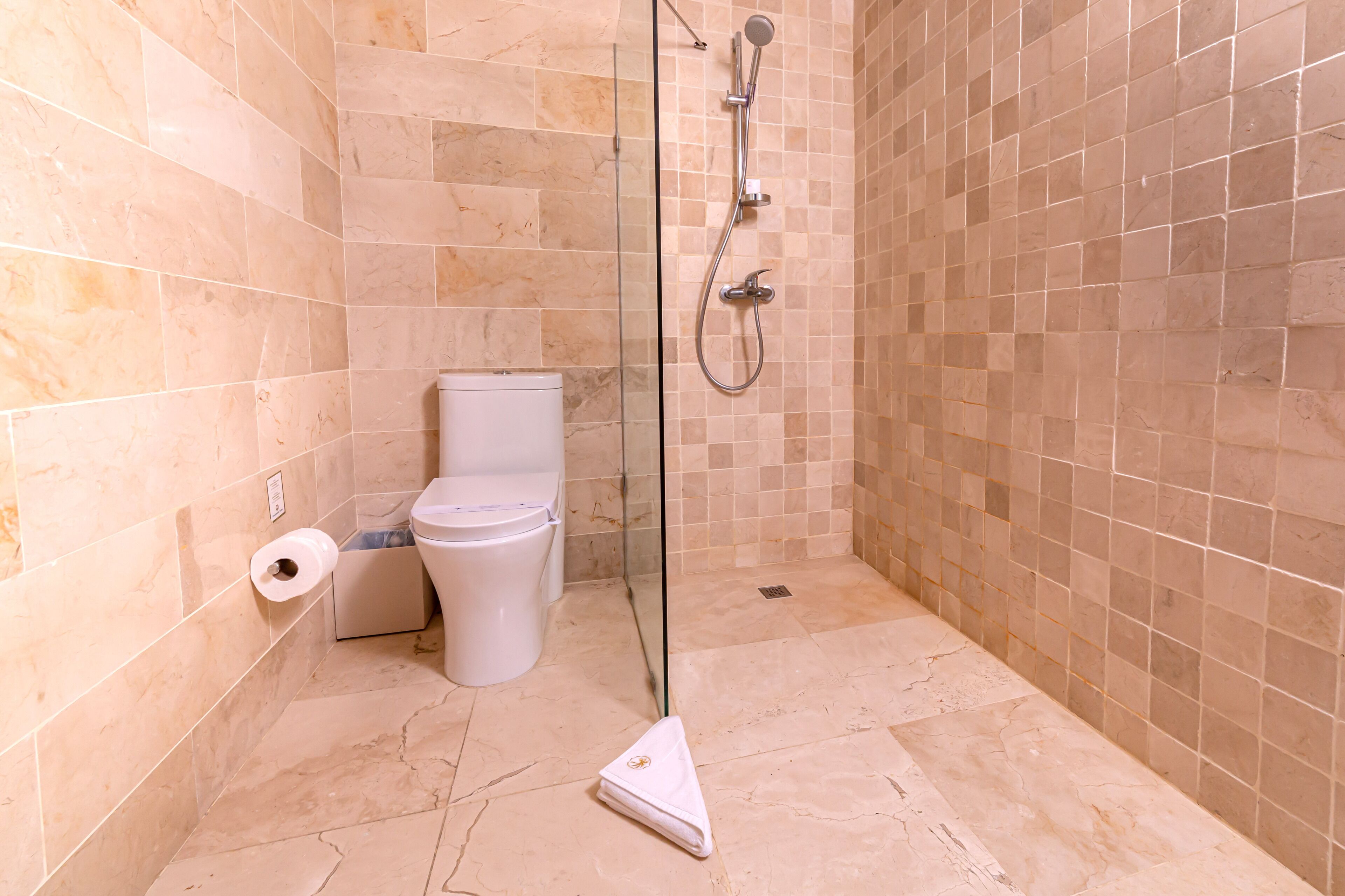 apartment, 1 bedroom, ocean view | bathroom | shower, rainfall showerhead, free toiletries, hair dryer