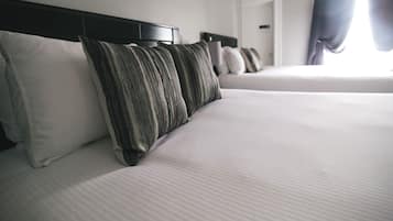 Suite, 2 queensize bedden, niet-roken, kitchenette | Luxe beddengoed, verduisterende gordijnen, een strijkplank/strijkijzer