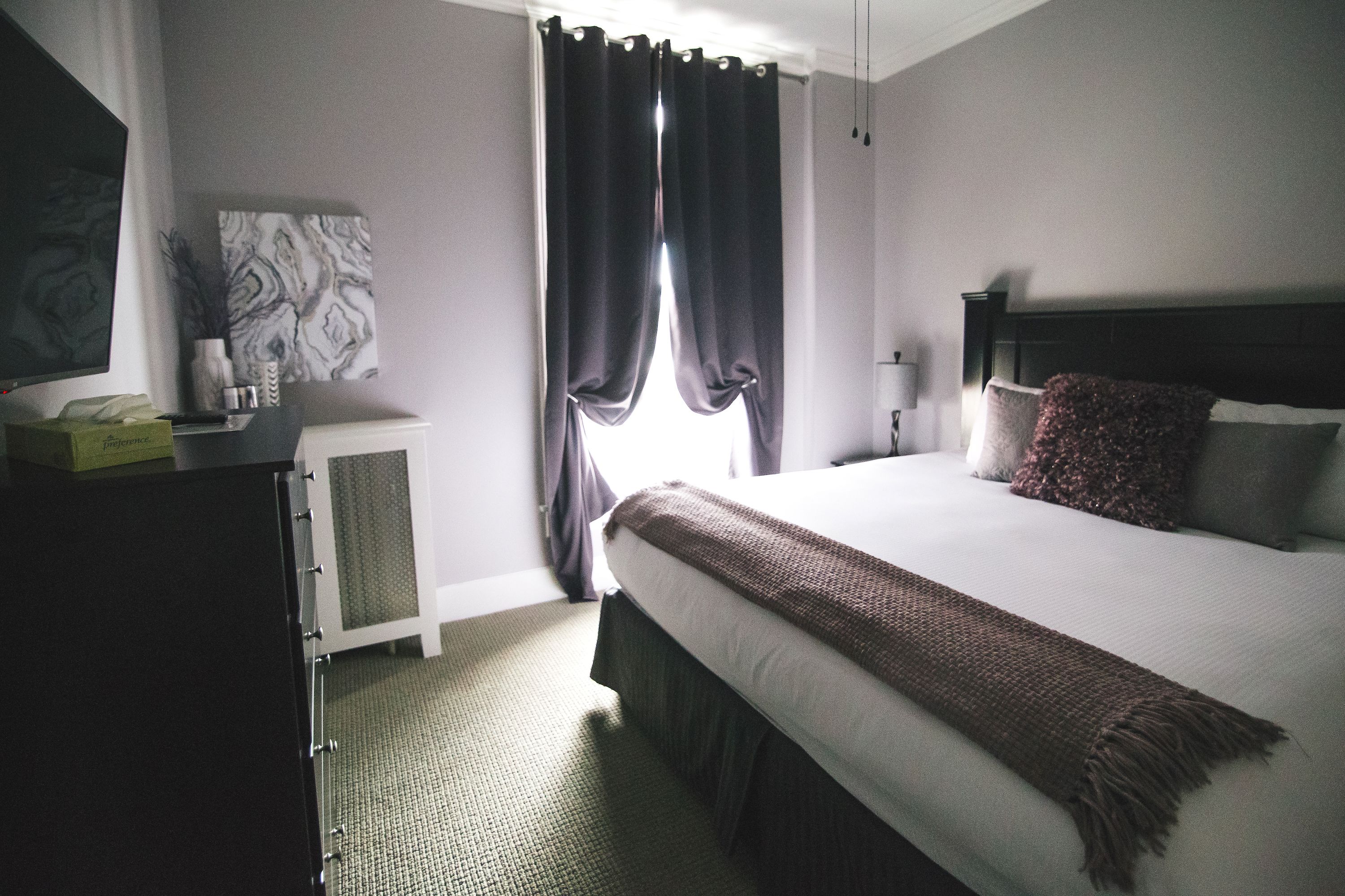 executive suite, 1 king bed, non smoking, kitchenette | premium bedding, blackout curtains, iron/ironing board, free wifi