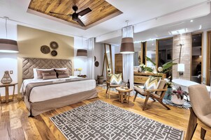 Premium Studio Suite, 1 King Bed, Bathtub, Garden View | Premium bedding, minibar, in-room safe, individually decorated