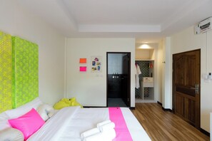 Deluxe King | In-room safe, individually decorated, desk, blackout curtains