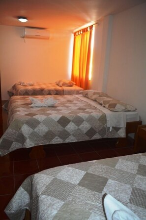 Standard Quadruple Room, 1 Bedroom, Tower | Free WiFi, bed sheets - Muyuyo (Puerto Ayora)