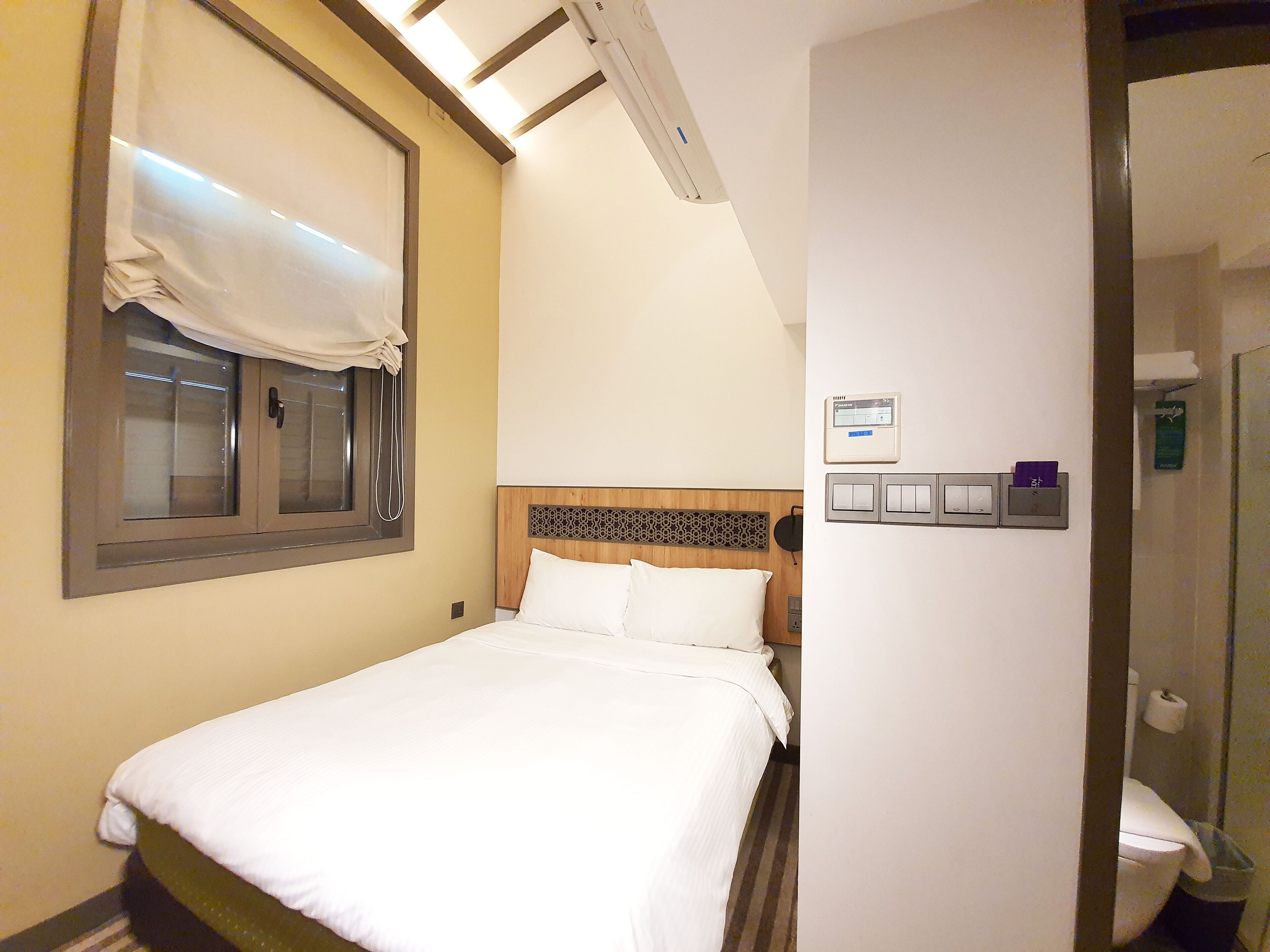 cozy room | premium bedding, in-room safe, desk, iron/ironing board