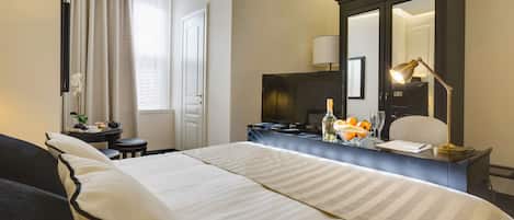 1 chambre, coffres-forts dans les chambres, fer et planche à repasser