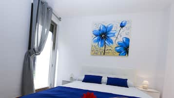 4 slaapkamers, een strijkplank/strijkijzer, gratis wifi, beddengoed