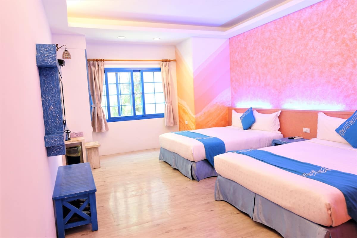 Elite Quadruple Room | Premium bedding, individually decorated, individually furnished