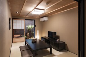 Japanese Style Town House | Living area | Flat-screen TV - Rinn Manjuji (Kyoto)