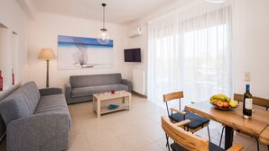 Deluxe Apartment, 1 Bedroom, Non Smoking, Balcony | Living area | Flat-screen TV - Aequor Luxury Apartments (Chania)