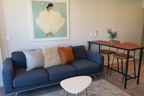 Premium bedding, blackout curtains, soundproofing, iron/ironing board