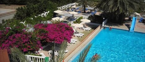 2 outdoor pools, pool umbrellas, pool loungers