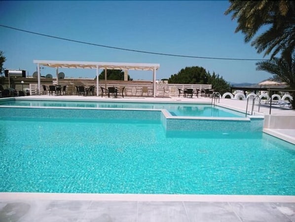 2 outdoor pools, pool umbrellas, sun loungers