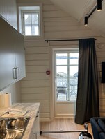 Deluxe Quadruple Room, 2 Bedrooms, Balcony, Ocean View | Living area | Smart TV, heated floors