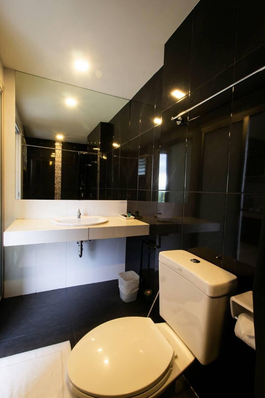 family room | bathroom | shower, free toiletries, hair dryer, towels