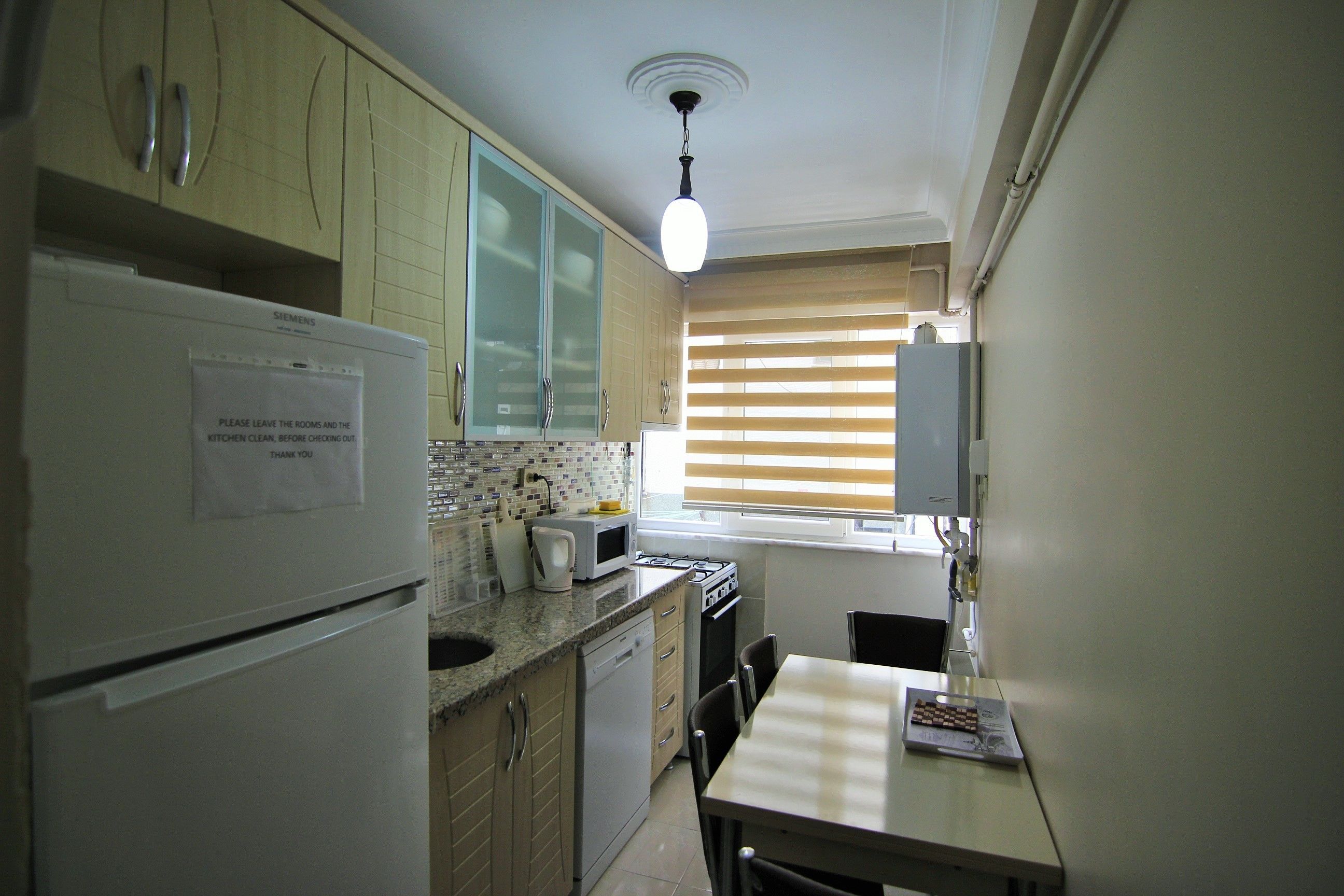 Deluxe Apartment, 1 Bedroom | Private kitchen | Fridge, microwave, oven, stovetop