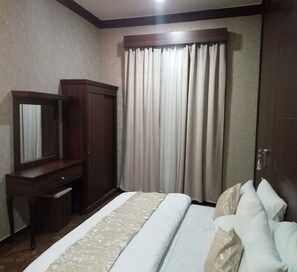 1 chambre, coffres-forts dans les chambres, fer et planche à repasser