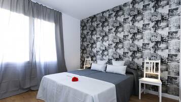3 slaapkamers, een strijkplank/strijkijzer, gratis wifi, beddengoed