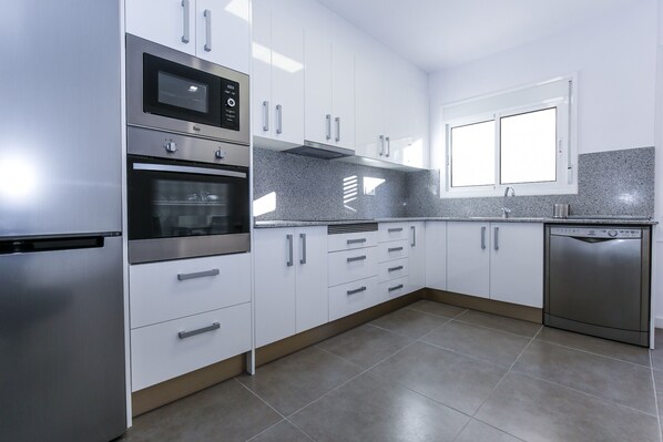 Fridge, microwave, oven, dishwasher