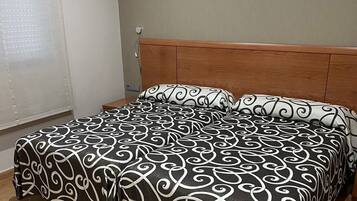Desk, blackout curtains, soundproofing, iron/ironing board