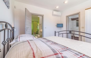 4 quartos, berço de viagem, Wi-Fi de cortesia, roupa de cama