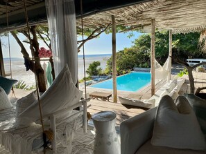 Luxury Villa, 4 Bedrooms, Ocean View | Living area | Flat-screen TV - Azulik Lodge (Vilanculos)