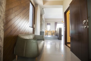 Deluxe Quadruple Room, Lanai | Bathroom | Shower, free toiletries, hair dryer, slippers