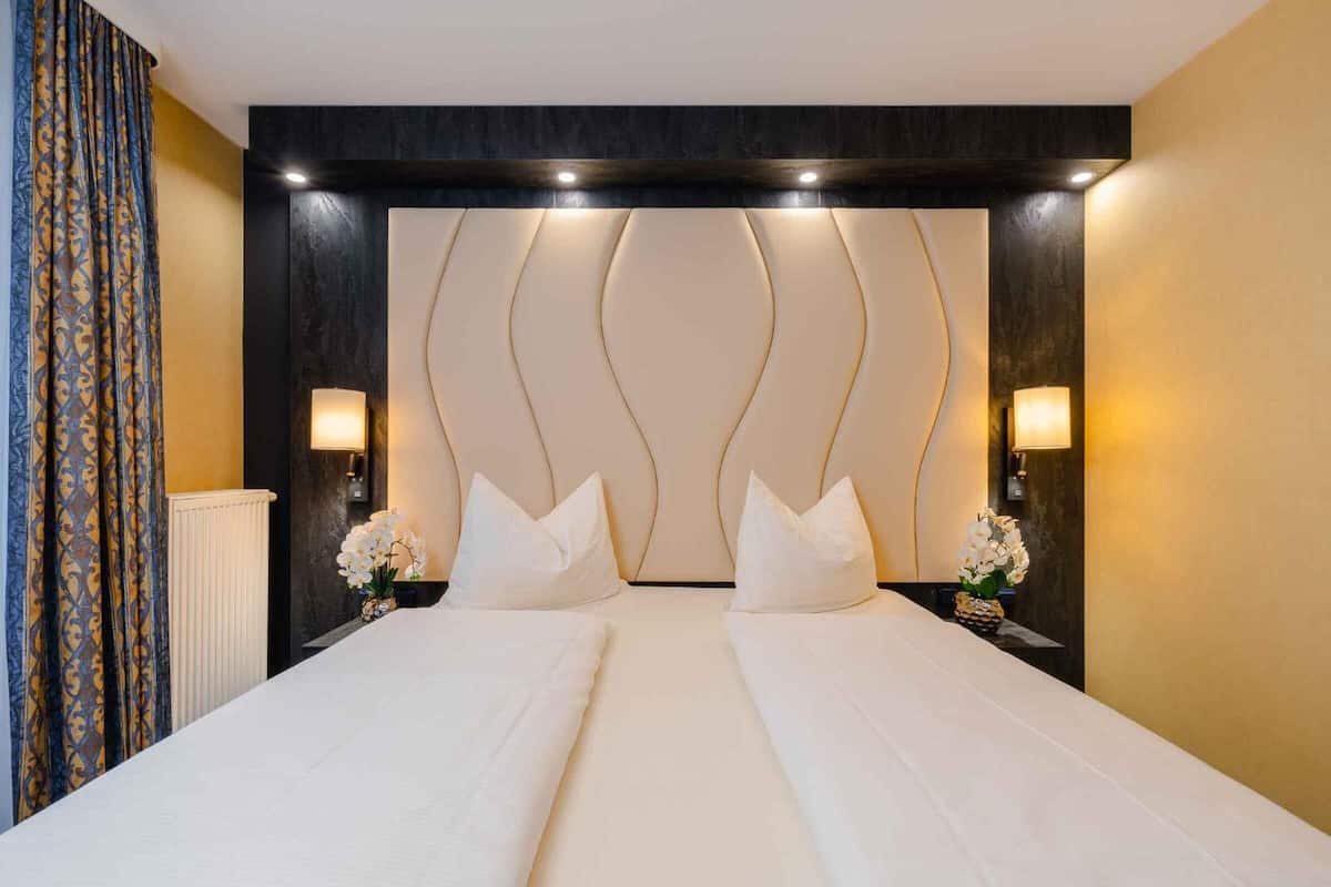 Hypo-allergenic bedding available, in-room safe, desk, soundproofing