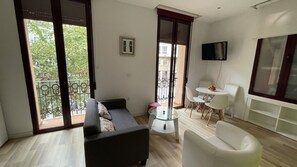 Comfort Apartment, 1 Bedroom, Balcony, Beachside | Living area | 35-inch Smart TV with satellite channels, TV